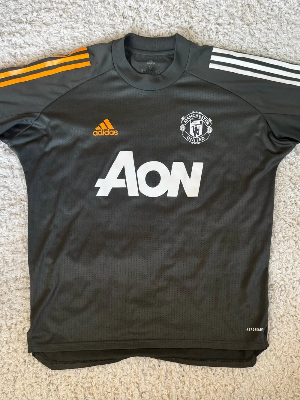 Adidas Manchester United Black Training Jersey with Orange Accents